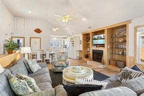 Gather on the Top Level for memorable moments in the bright, open Living Area, perfect for unwinding after a day on the beach.