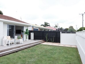 Soak up the coastal vibe lounging on the timber deck, the perfect morning coffee