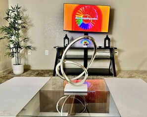 Spacious Living Room with TV