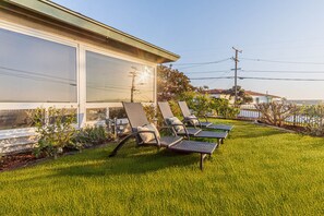Soak up the sun in these comfortable lawn chairs.