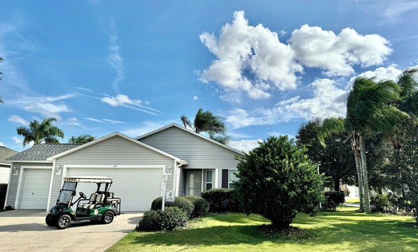 House Front w/ 4-Seater Golf Cart for Guest Use