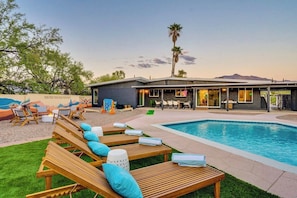 Expansive backyard designed with fun and relaxation in mind.