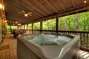 Relax in the hot tub to the sounds the rushing creek 