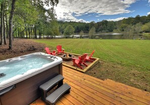 Soak in the hot tub as you enjoy the view of Lake Buckhorn