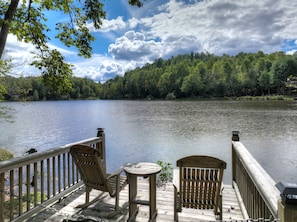 Relax on the dock with a beverage of choice as you enjoy this lake front setting 