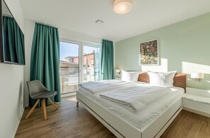 Ferienwohnung Wasserlilie Malchow Blick in eines der Schlafzimmer