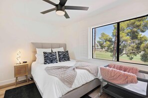 Bedroom 4 with queen bed and Travel crib