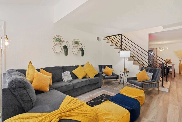 Living area with ample seating and Smart TV