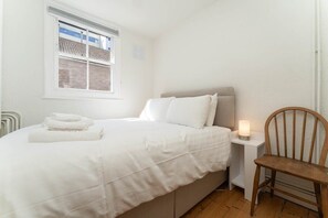The bedroom reflects tranquility and harmony