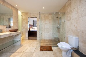 Enjoy this stylish and spacious bathroom with twin sinks
