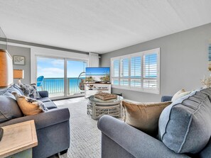 Beautifully updated living room with balcony access