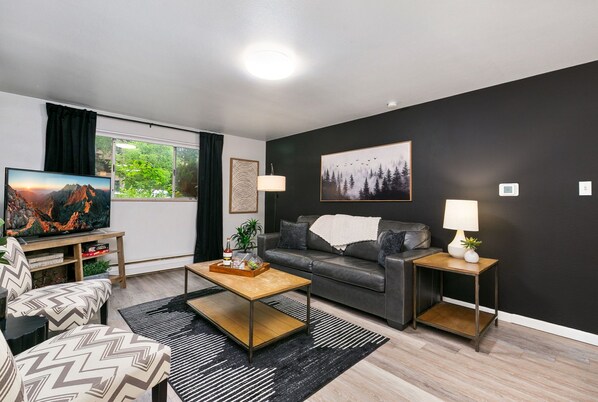 220 Peterson St. (Unit 1) | Living Area with Smart TV
