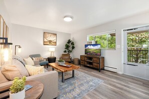 220 Peterson St. (Unit 6) | Living Area with Smart TV