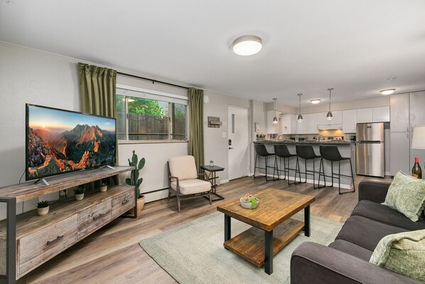 220 Peterson St. (Unit 4) | Living Area with Smart TV