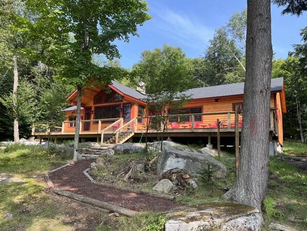 A dedicated walking path leads to the main house.