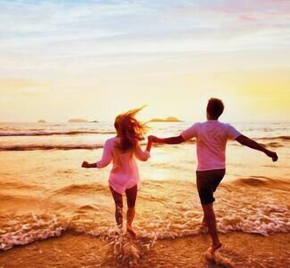 Enjoy a romantic evening stroll on the beach. Water is always the perfect temperature.