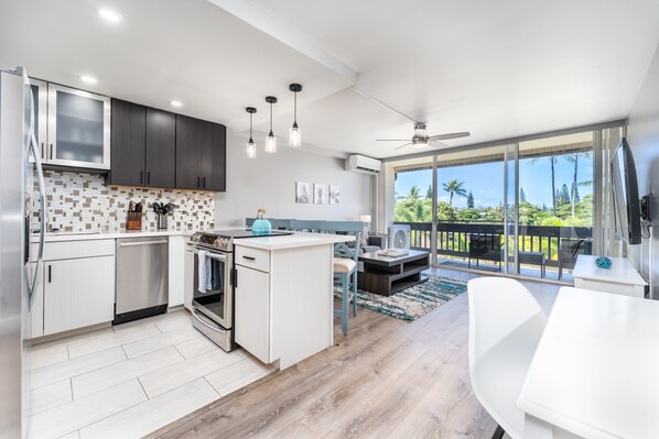 Newly renovated Kitchen, Luxury Vinyl Plank flooring, Cable/Smart TV, Queen sofa sleeper, Desk, quiet cold Split AC and floor to ceiling sliding glass door to Lanai