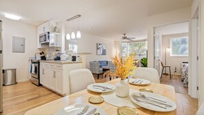 Dining Table. Plates, dishes, glasses, coasters, utensils, chopsticks, and kid-friendly utensils provided.