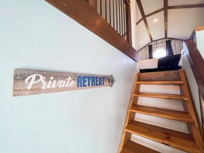 The stairs leading to the Master Bedroom loft