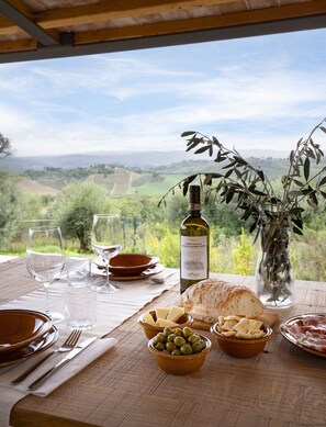 Good olive oil, fresh bread and tomatoes, a glass of red wine - one of life's delights.