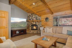 A beautiful rock gas fireplace is the focal point in the main living area providing warmth and charm.