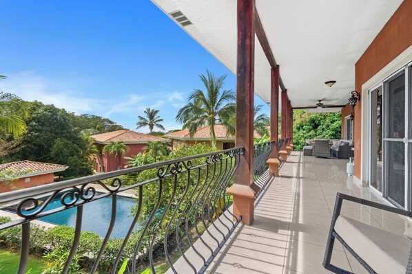 large patio area overlooking the pool