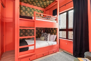 Bedroom #2 with queen size built-in bunk beds, reading lights and wallpaper on the ceiling. It's like sleeping in a cocoon!