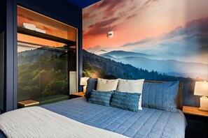 “Hell of a View”:  3rd  bedroom with king size bed, darkening shades, open closet for clothes, dresser, and en-suite bathroom
