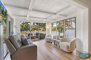 Comfortable sun room with smart TV