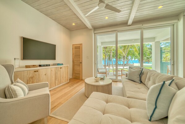 Large open concept living just steps from the sand with beautiful ocean views