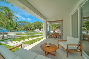 Large private porch with both ocean and pool views