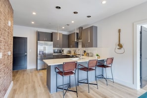 Sleek, fully equipped kitchen.