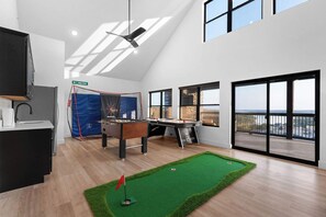 The game room on the second floor is sure to entertain for hours!