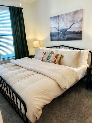 Cozy king bed in private bedroom