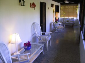 The entranceway to the home include a living room/large sitting area.