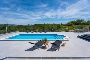 A private 8m x 4m swimming pool
