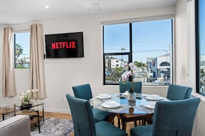 Enjoy meals together at this stylish dining table with seating up to six.