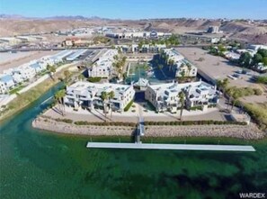 Dock in front of the units ON THE RIVER.  Mine is second from far left side