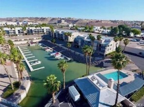 Pool and Hot Tub are behind my unit's garage and the Marina is behind there