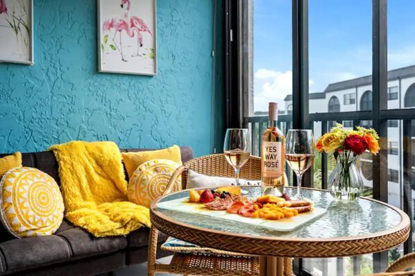 Bright and airy space with stunning floor-to-ceiling windows with balcony