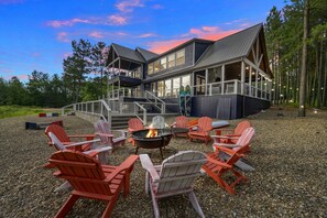 Imagine evenings spent fireside, just steps from your cozy cabin. Gather under the stars, share stories, and let the crackling fire bring warmth to unforgettable nights in nature.