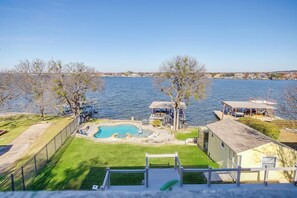 Enjoy breathtaking views of the lake from above with a poolside retreat.