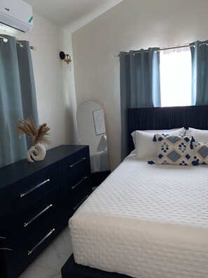 Dresser to pack away clothing & full length mirror perfect for a “fit check”