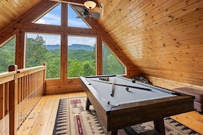 Unleash your competitive side with a game of pool in the loft!