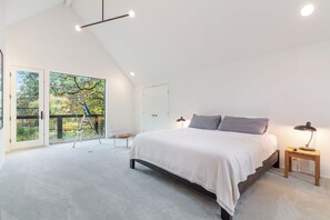Rest and restore in these charming bedrooms, where a telescope invites you to discover the universe.