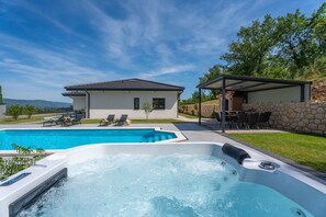 The villa has a wonderful relaxing area with a jacuzzi