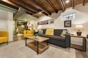 Modern and artsy living area with a homey atmosphere.