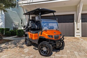 Zip around in the 4 seater golf cart