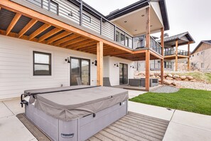Back Exterior | Spacious Deck | Furnished Patio | Hot Tub