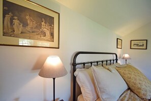 USB charge points beside the bed